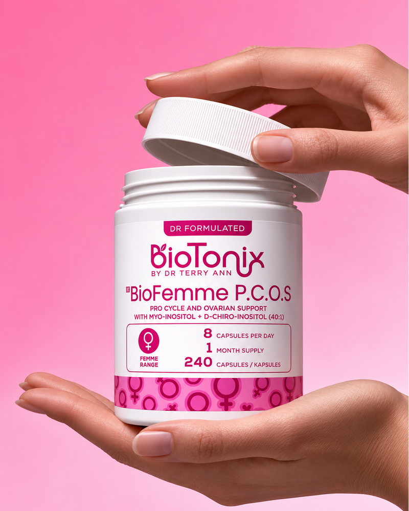 BioTonix BioFemme P.C.O.S 240-capsule supplement bottle held against a pink background.