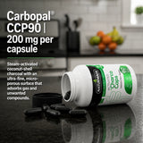 Open Naturmade Charco Caps bottle displaying black charcoal capsules and Carbopal CCP90 ingredient detail.