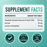 Supplement facts label for Naturmade Charcoal Chewies detailing 125mg C-Extra USP chewable charcoal, sucrose, and lactose monohydrate per tablet.
