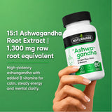 Hand holding a bottle of Naturmade Ashwagandha B-Calm Plus 60 capsules supplement.