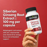 Hand holding Naturmade Ginseng Complex bottle featuring 100mg Siberian Ginseng Root Extract per capsule.
